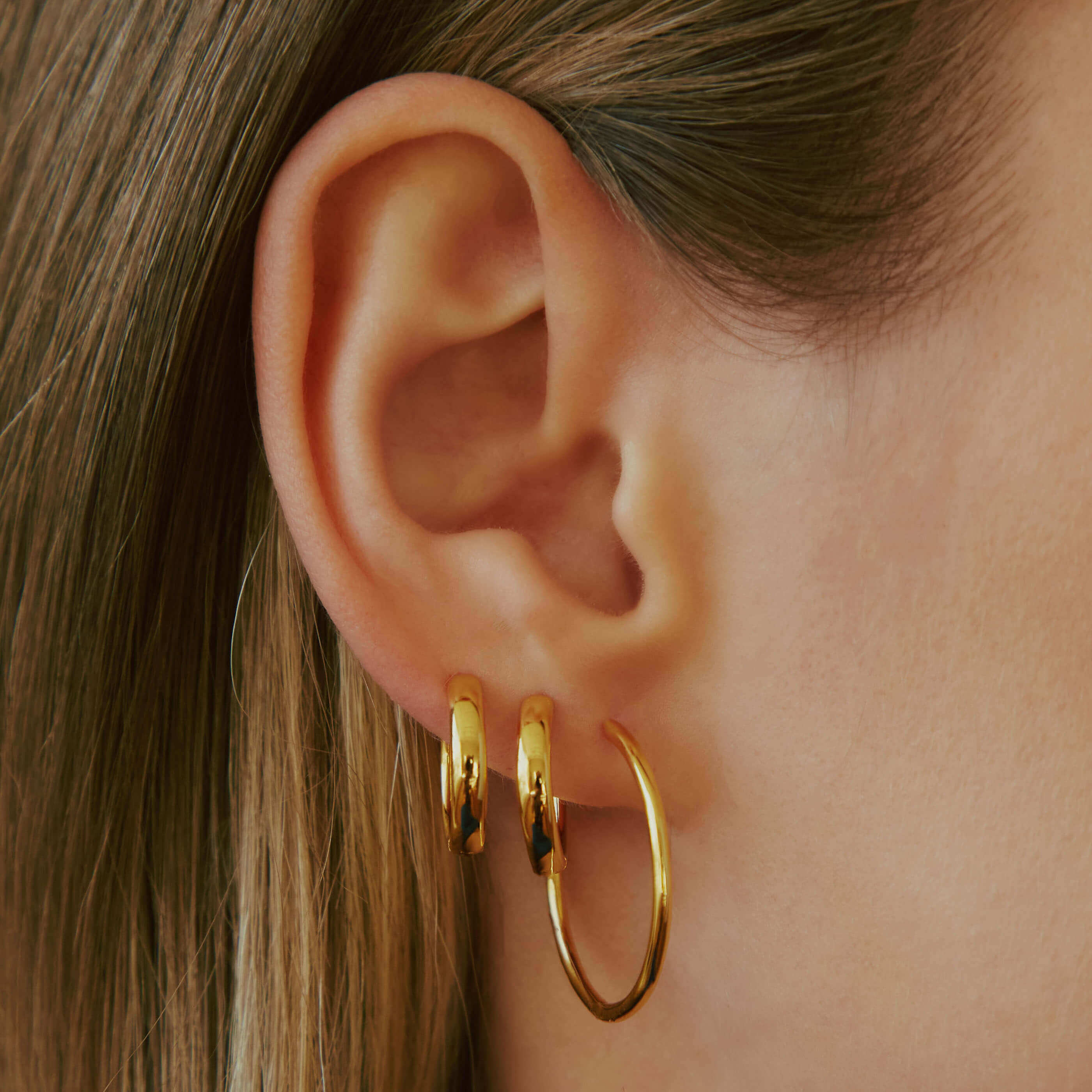 Classic 1" Hoops in Titanium (Gold) on model