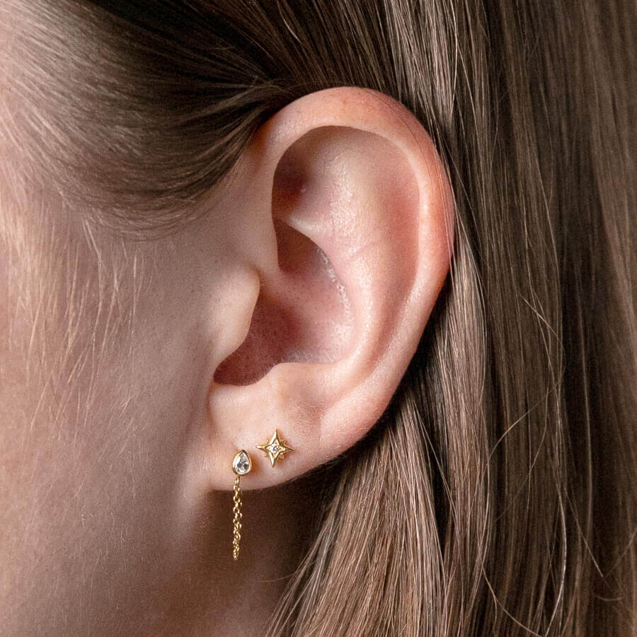 North Star Nap Earrings (Gold) on model