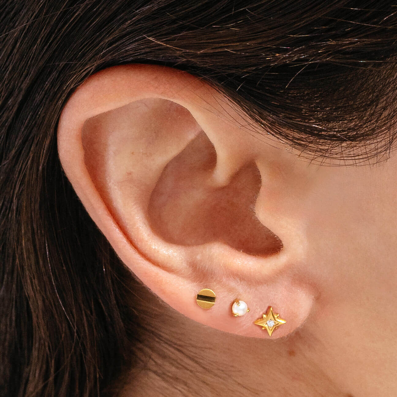 North Star Nap Earrings (Gold) on model