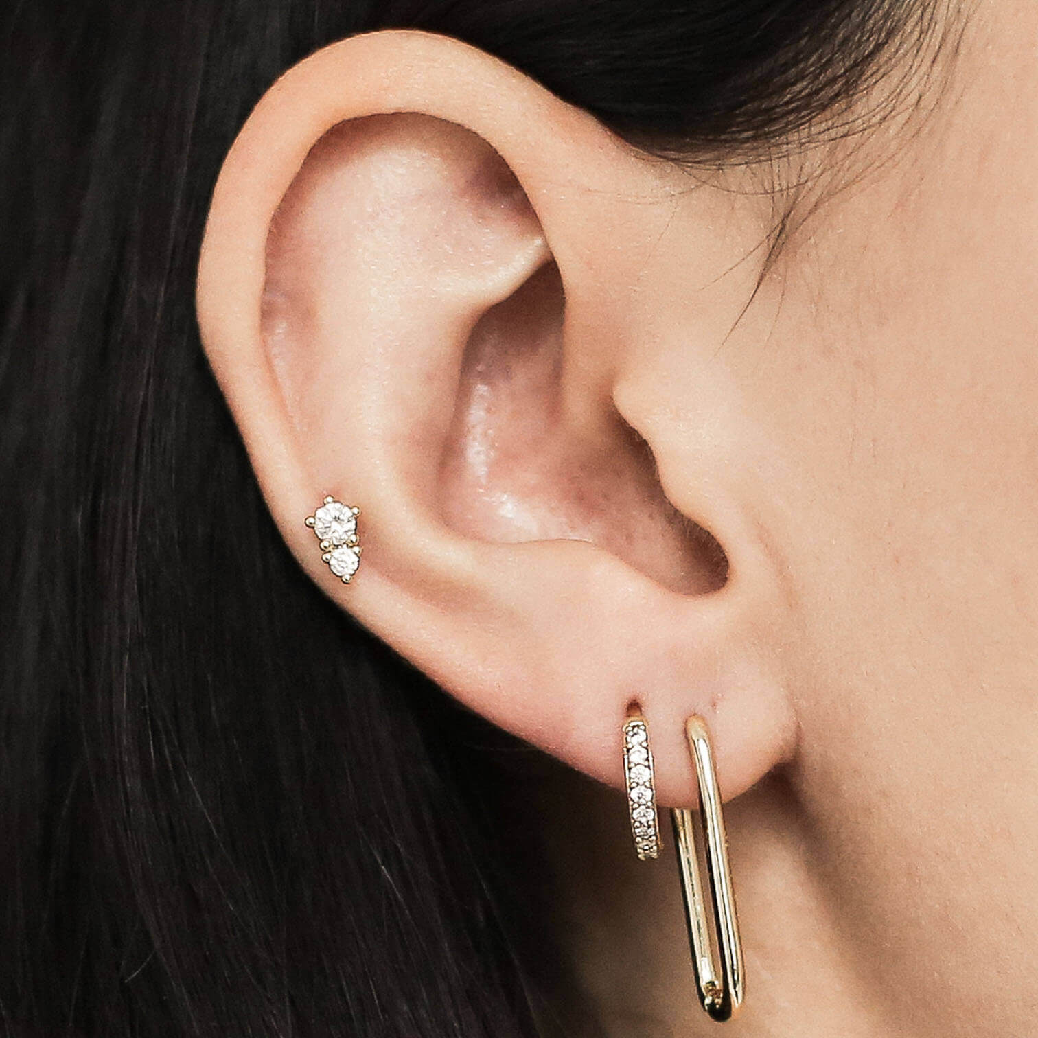 Gaia Threaded Flat Back Earring (Titanium - Gold) on model