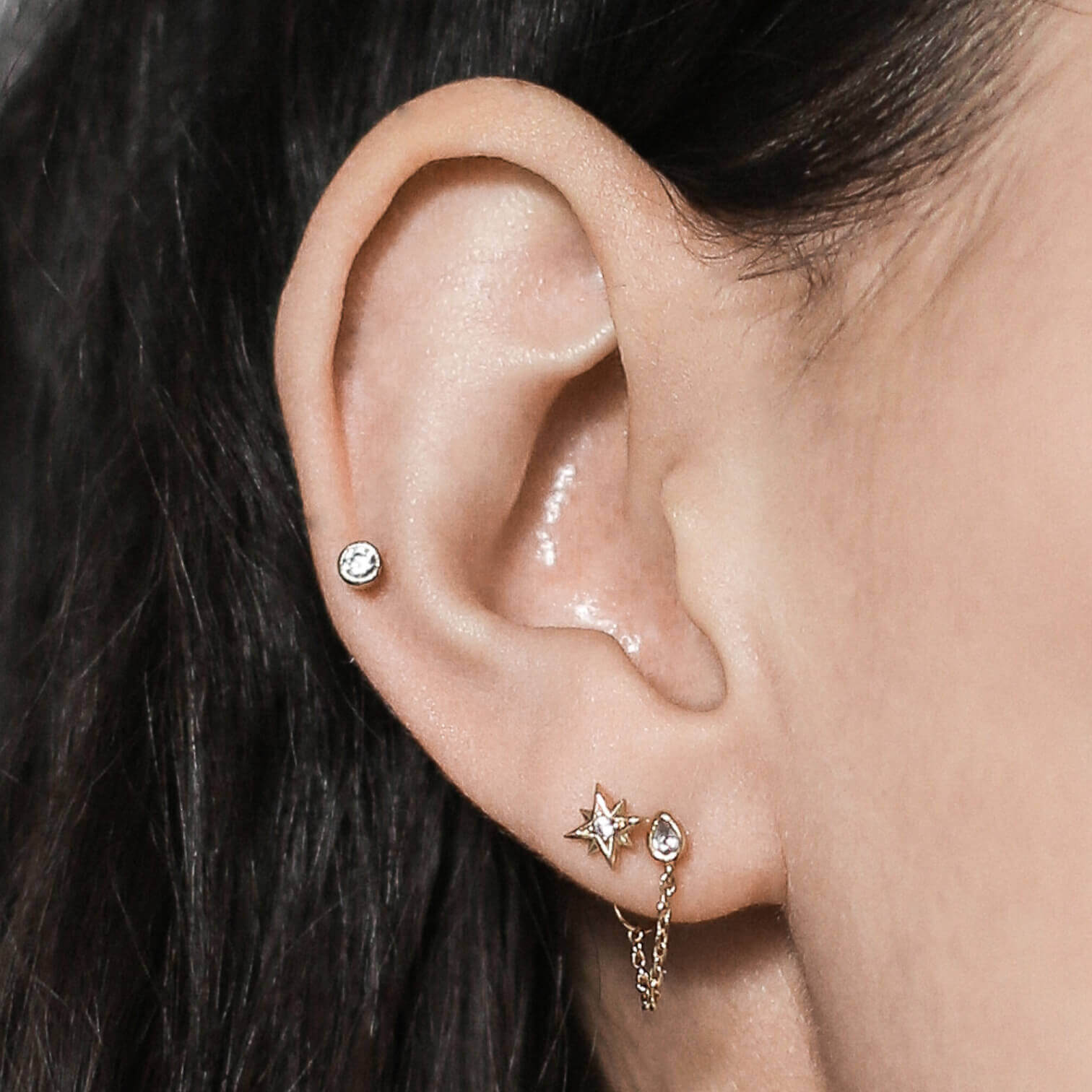 Tiny Crystal Threaded Flat Back Earring (Titanium - Gold) on model