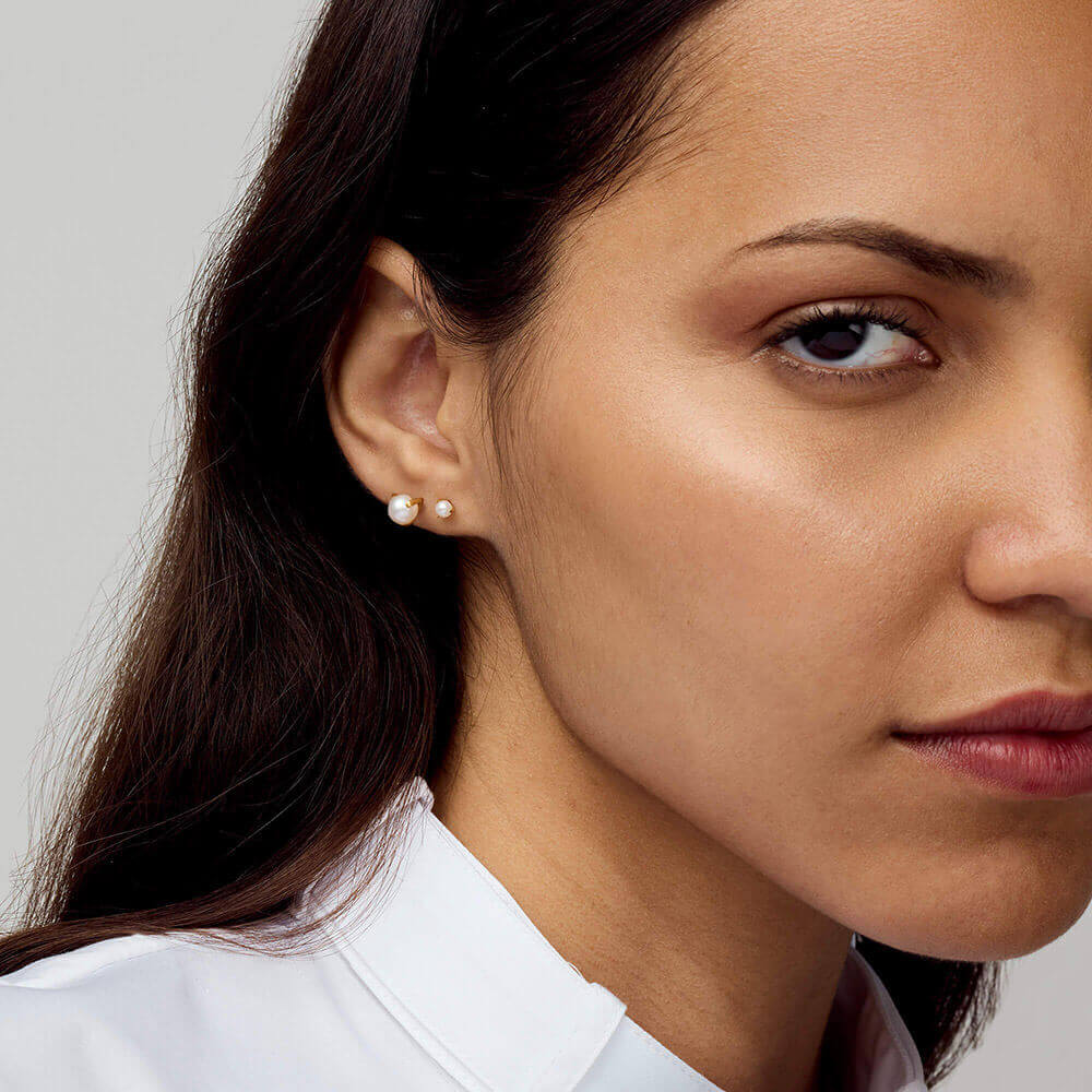 3mm and 6mm Pearl Nap Earrings on model in gold