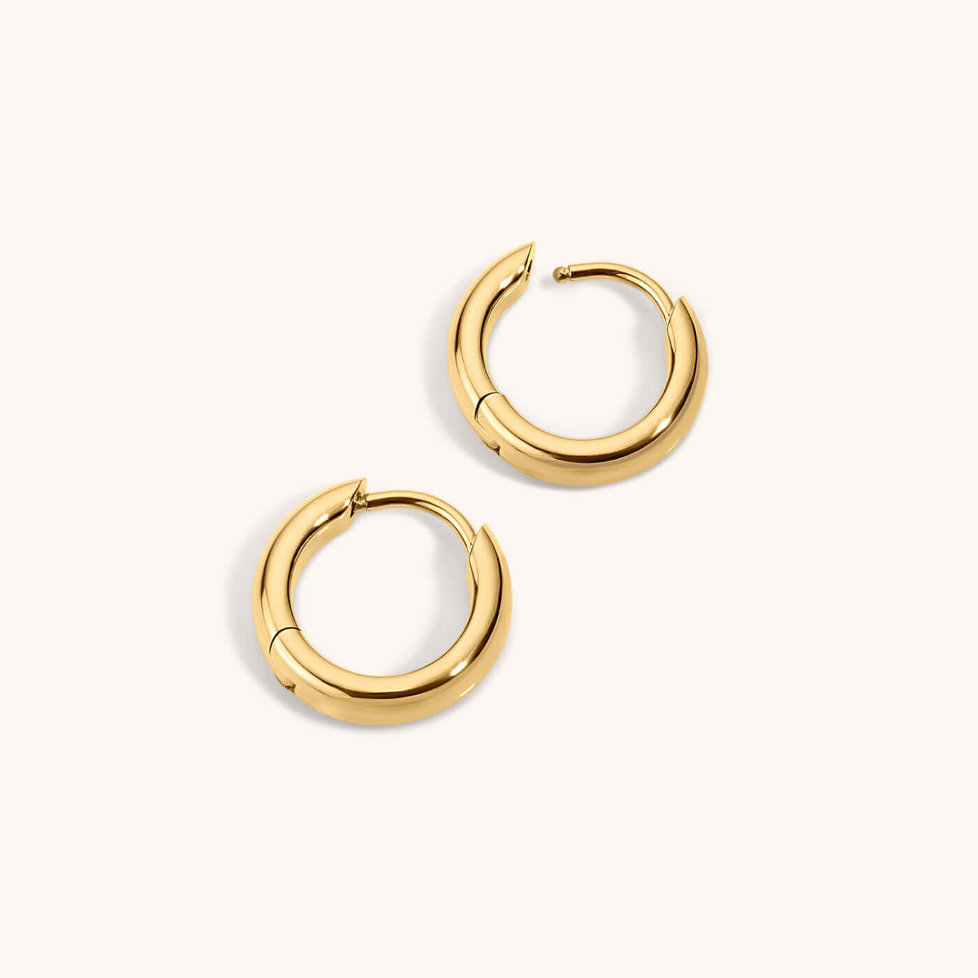Bold Huggie Hoops in Titanium - Gold