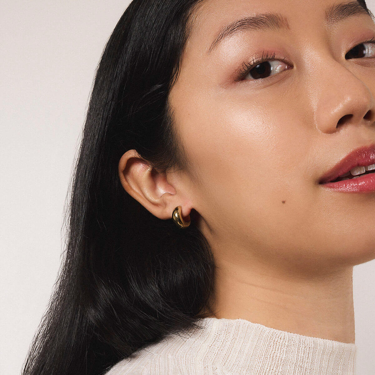 Dewdrop Huggies in Titanium - On Model (Gold)