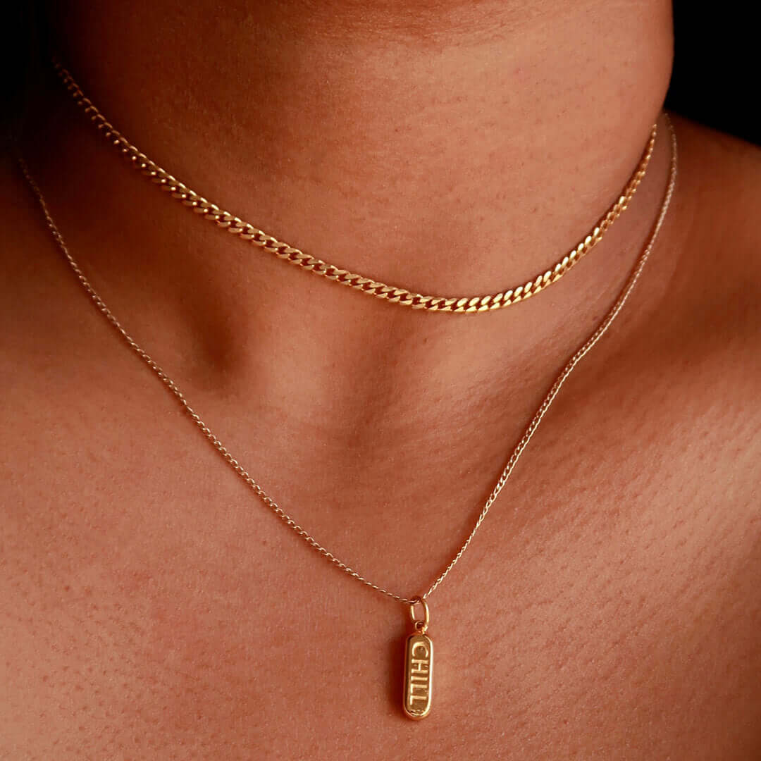 Rebel Necklace with Chill Pill Necklace (Gold) on model