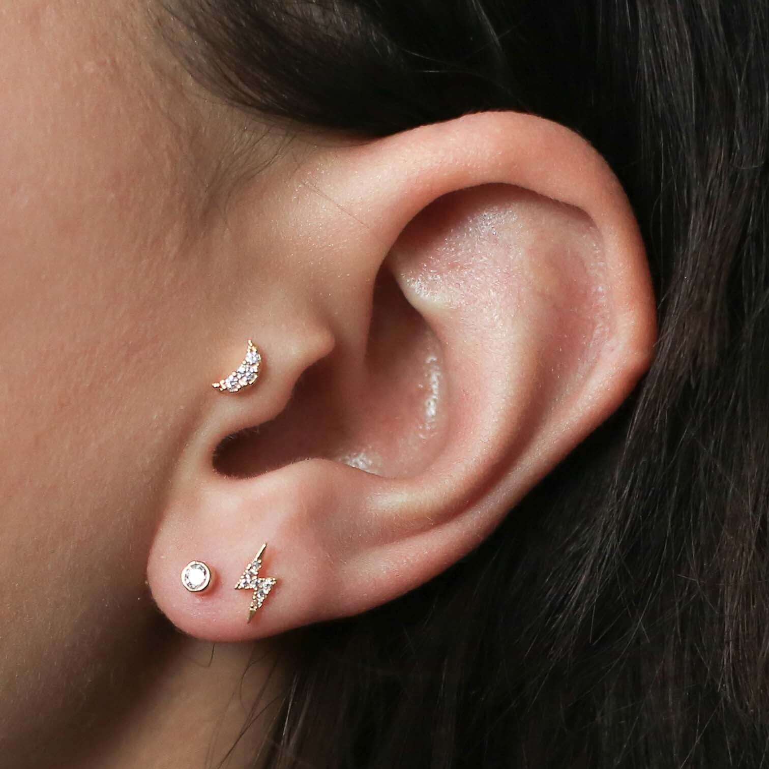 Tiny Diamond Studs in 14K Gold on model