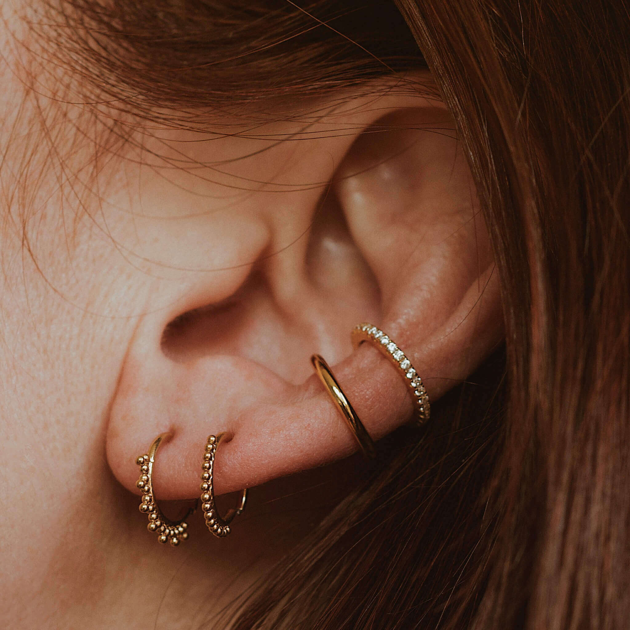 Eternity Cartilage Hoop on model (Titanium - Gold)