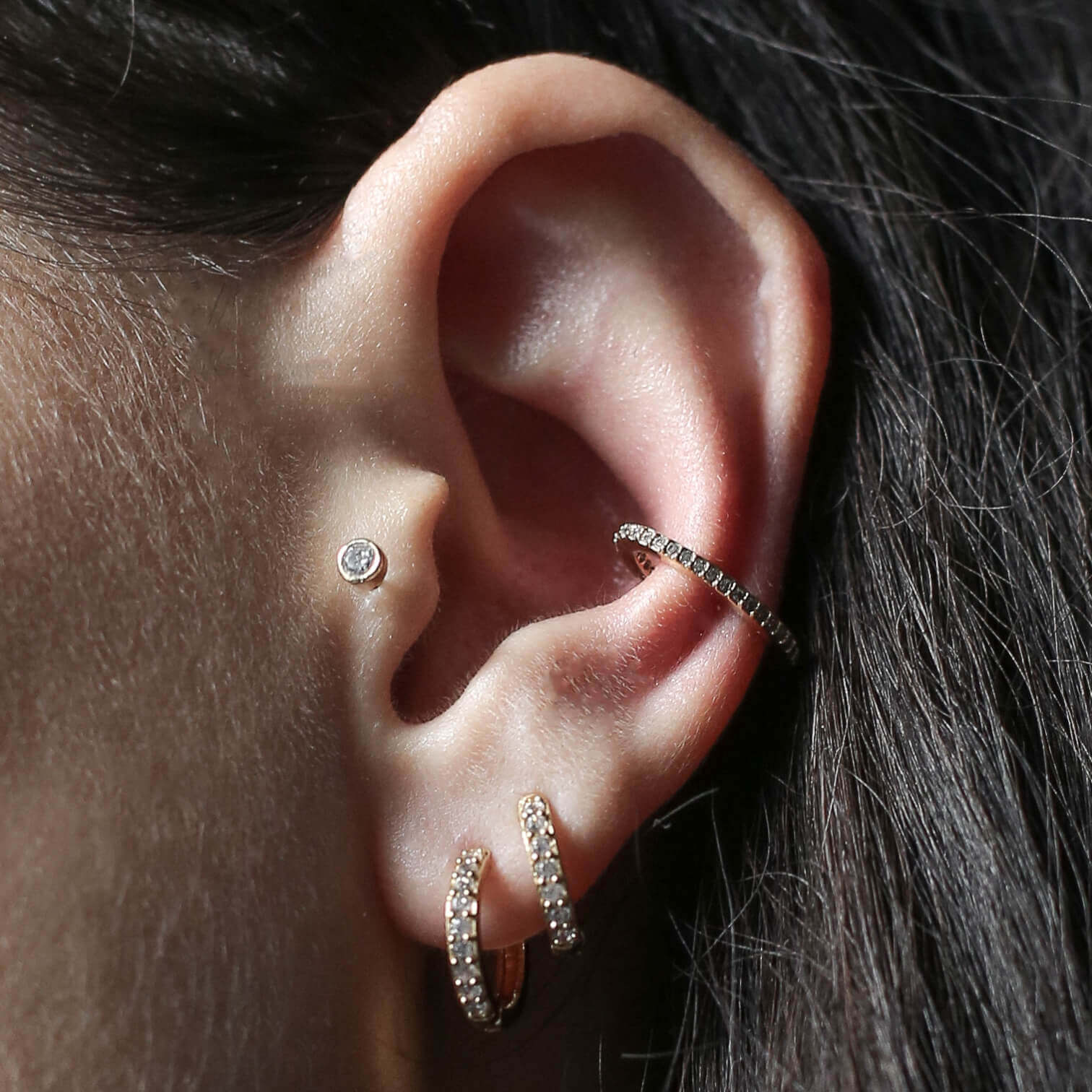 Tiny Crystal Threaded Flat Back Earring (Titanium - Gold) on model